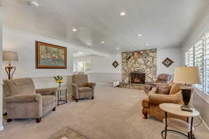 Living room, crown molding, and a healthy amount of sunlight
