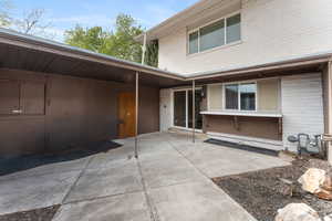 Entrance to property with brick siding