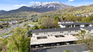 Drone / aerial view with a residential view and a mountain view