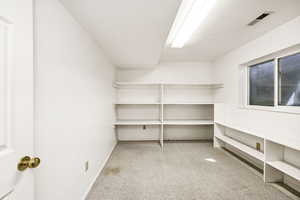 Storage room featuring visible vents