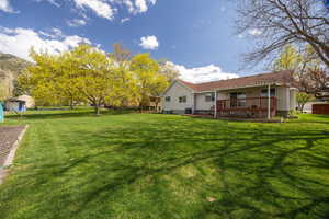 View of yard with a deck