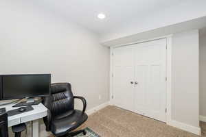Office space with recessed lighting, carpet flooring, and baseboards
