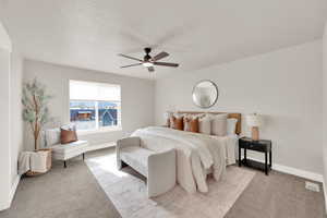 Primary Bedroom featuring an on-suite bathroom and walk in closet.