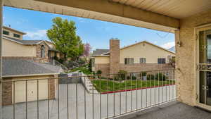 View of gate with a residential view