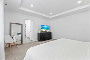 Primary bedroom with ample space for oversized furniture