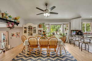 Dining room with recessed lighting, light wood-type flooring, and ceiling fan