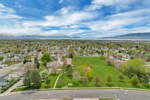 Birds eye view of property with a residential view and a mountain view