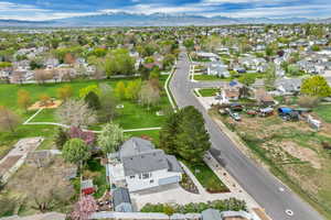Drone / aerial view featuring a residential view and a mountain view
