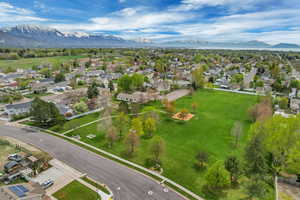 Birds eye view of property featuring a residential view and a mountain view