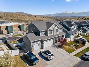 Drone / aerial view with a residential view and a mountain view
