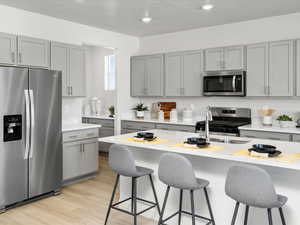 ***"Please Note: This is not the actual home. The photo is of a model home with the same floor plan.***