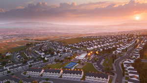 Drone / aerial view featuring a residential view and a water and mountain view