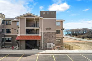 Lake Residences Building E with a Bear Lake view and uncovered parking