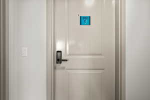 Door to Room C bedroom 3  from shared entrance of unit 302