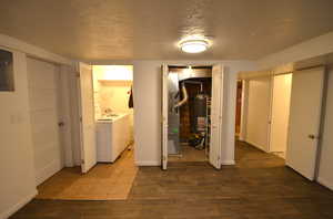 Left - Door to 2 car garageMiddle Left - Laundry RoomMiddle - Utility ClosetRight - Entrance to storage room and hallway to bedrooms and bathroom