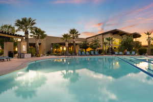 Community pool featuring a patio