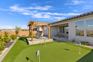 Exterior space with a pergola, fence, and a patio area