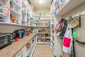 Storage area featuring a toaster