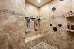 Bathroom featuring tiled shower