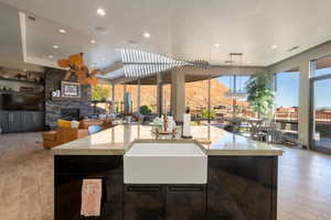 Kitchen featuring a wealth of natural light, visible vents, and light wood finished floors