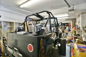Garage featuring a garage door opener