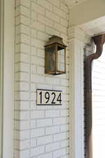 Exterior details featuring brick siding
