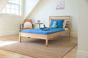 Interior space featuring wood finished floors and baseboards