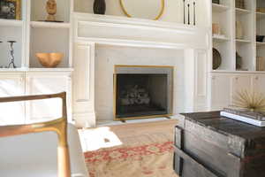 Living room with a high end fireplace