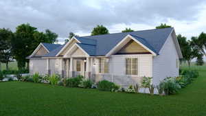 View of front facade with stone siding, an attached garage, a shingled roof, and a front lawn