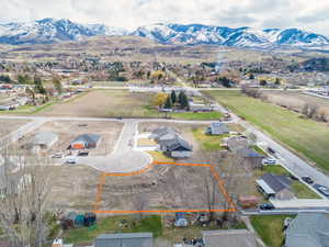 Birds eye view of property featuring a residential view and a mountain view