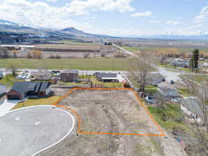 Lot 4 is larger than many of the other lots as it includes a retention basin that is part of the yard