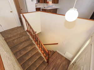 Staircase with wood finished floors