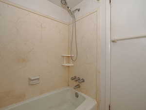 Full bathroom featuring shower / washtub combination