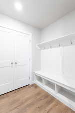 Mudroom featuring light wood-type flooring