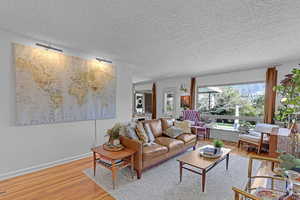 Living room view from hallway with view of huge picture window