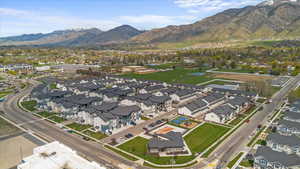 Drone / aerial view featuring a residential view and a mountain view