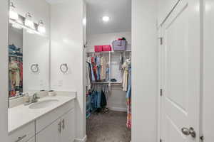 Walkin closet off of Primary Bathroom