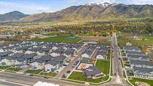 Aerial view featuring a mountain view and a residential view
