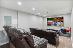 home theater / movie room with flexible / movable build out for rear stadium style seating