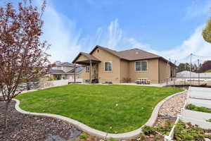 full automatic sprinklers including drip irrigation, five planter boxes. covered patio and easy to maintain landscape.