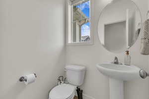 Bathroom featuring toilet and a sink