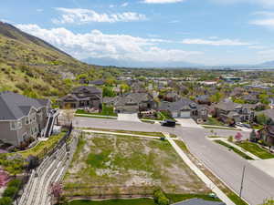 Drone / aerial view with a residential view and a mountain view