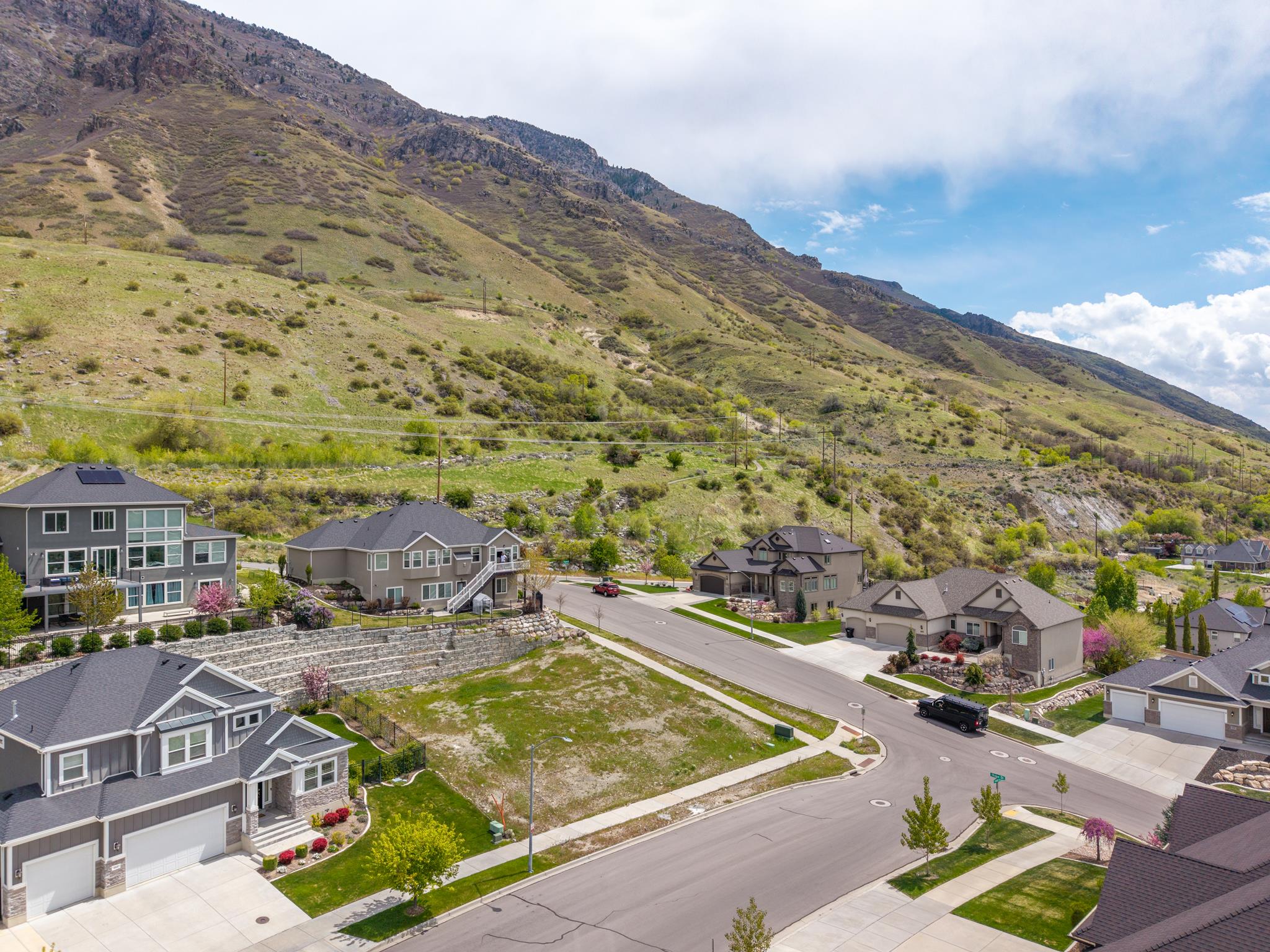 Property view of mountains featuring a residential view