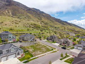 Property view of mountains featuring a residential view