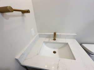 Bathroom with toilet and vanity