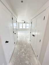 Corridor with lofted ceiling