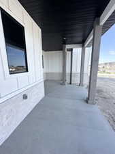 View of patio / terrace with an attached carport