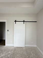 Interior space with baseboards and a closet