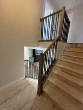 Stairway featuring baseboards