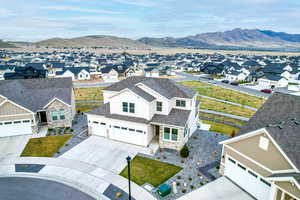 Drone / aerial view with a mountain view and a residential view